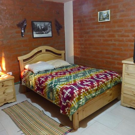 Hostal La Casa Amarilla City Baños Exteriör bild