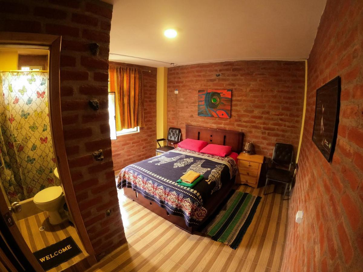 Hostal La Casa Amarilla City Baños Exteriör bild