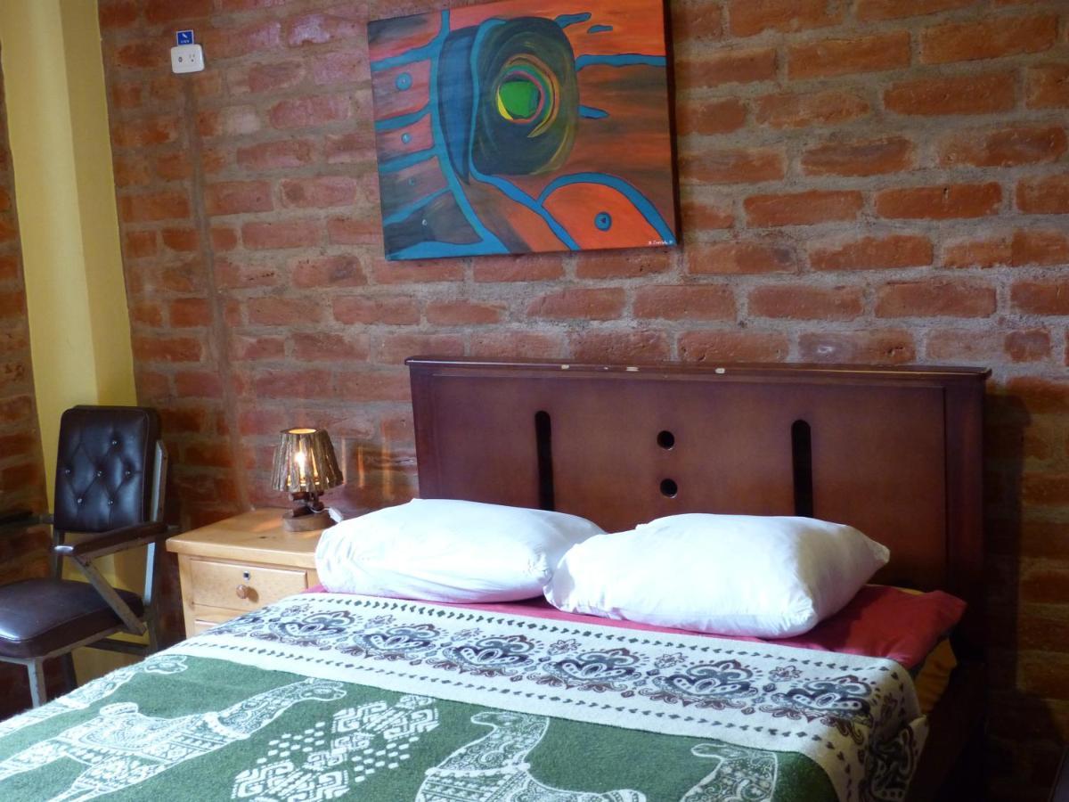 Hostal La Casa Amarilla City Baños Exteriör bild